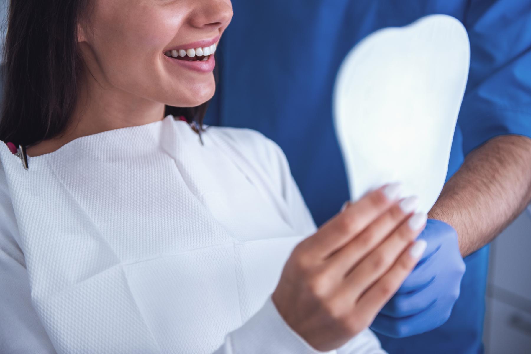 sani_dental_group_veneers_cost_in_mexico_patient_consultation_with_dentist