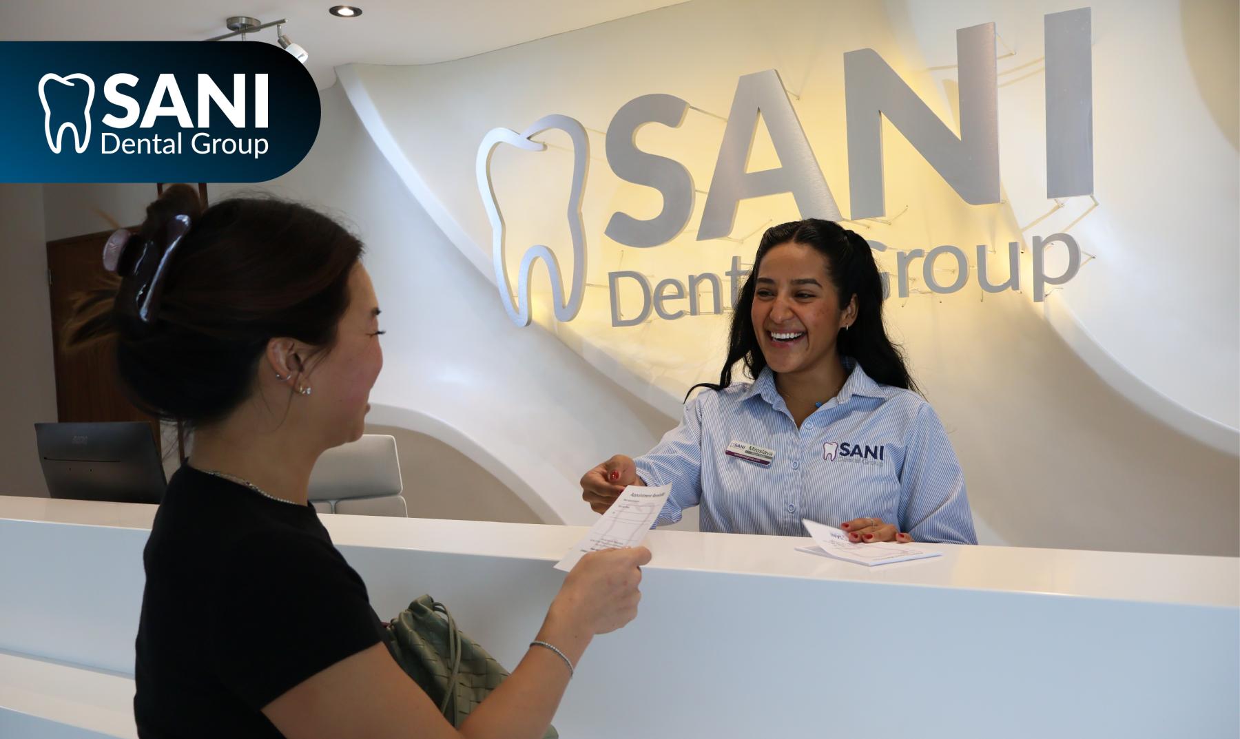 Sani-dental-group-how-much-are-dental-implants-in-mexico-for-americans International patient paying for affordable dental implants compared to usa in cancun mexico