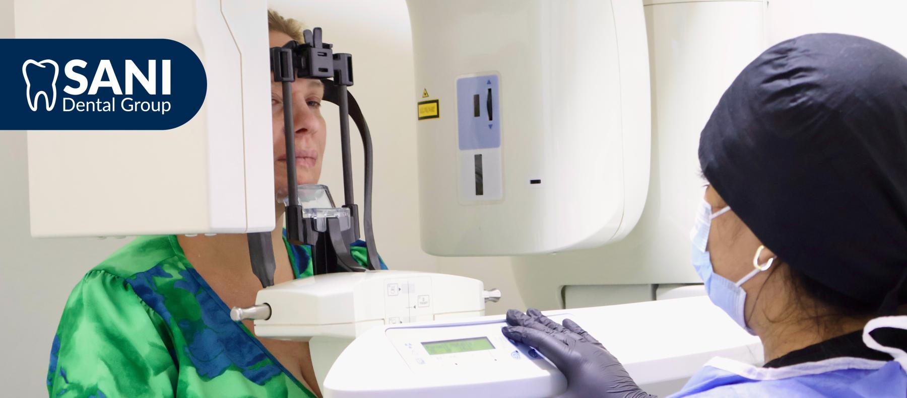 sani_dental_group_all_on_4_dental_implants_mexico_dental_lab_team Dental laboratory team preparing implant-supported prosthetics for All-on-4 dental implants in Mexico.